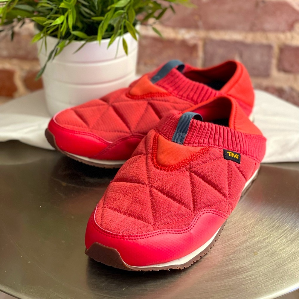SNEAKERS: Slip-on coral-colored Teva shoes. Size 9.